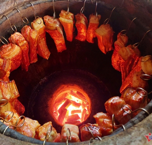 Thịt heo nướng lu